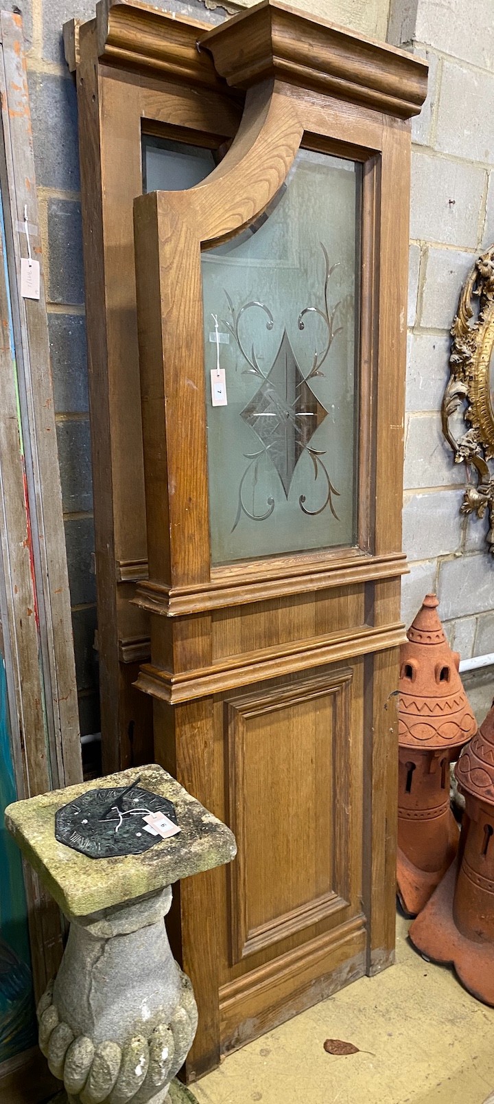 Two oak doors with etched glass panel windows, each width 68cm, height 218cm
